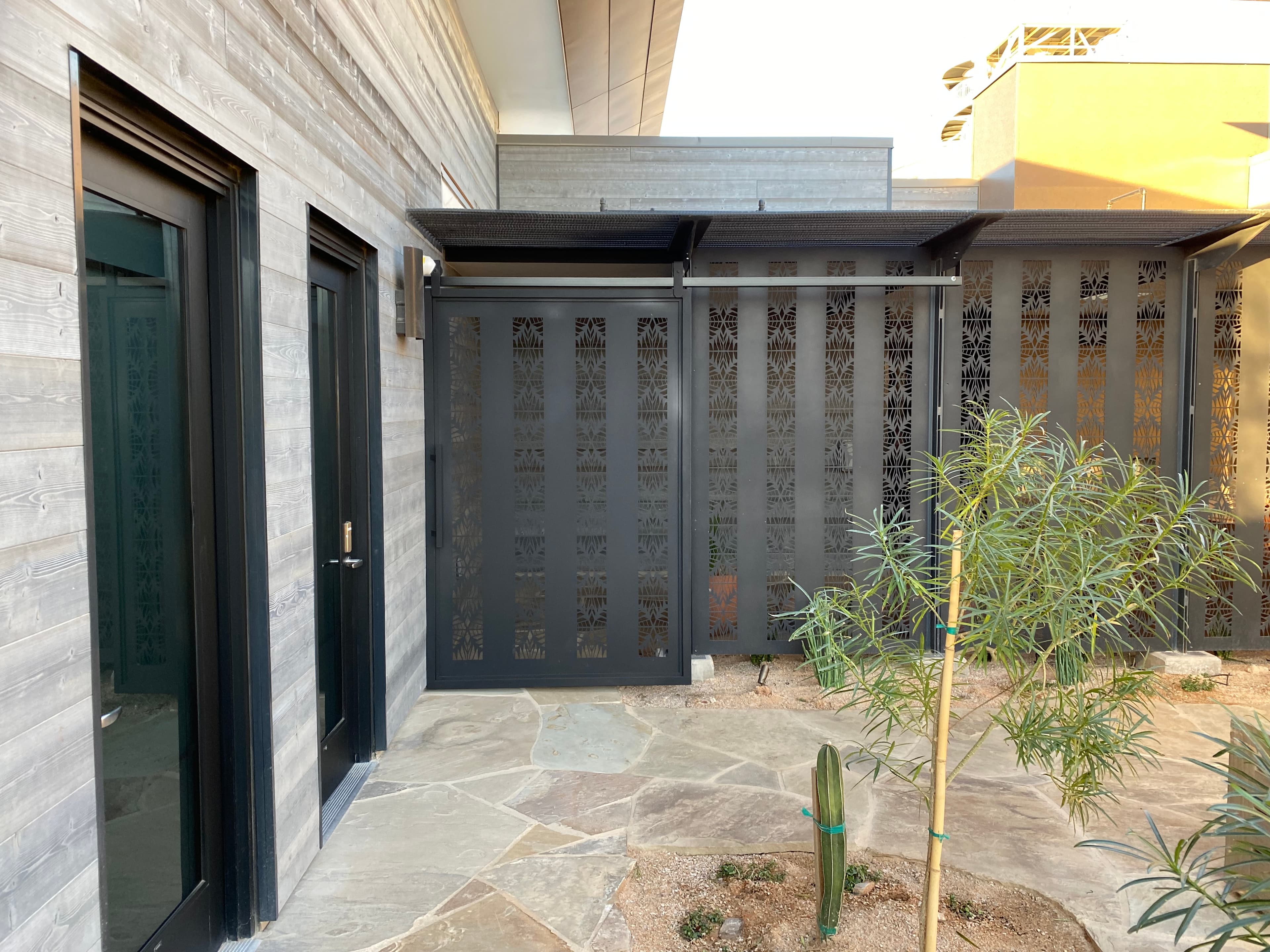 Decorative metal room divider with intricate design