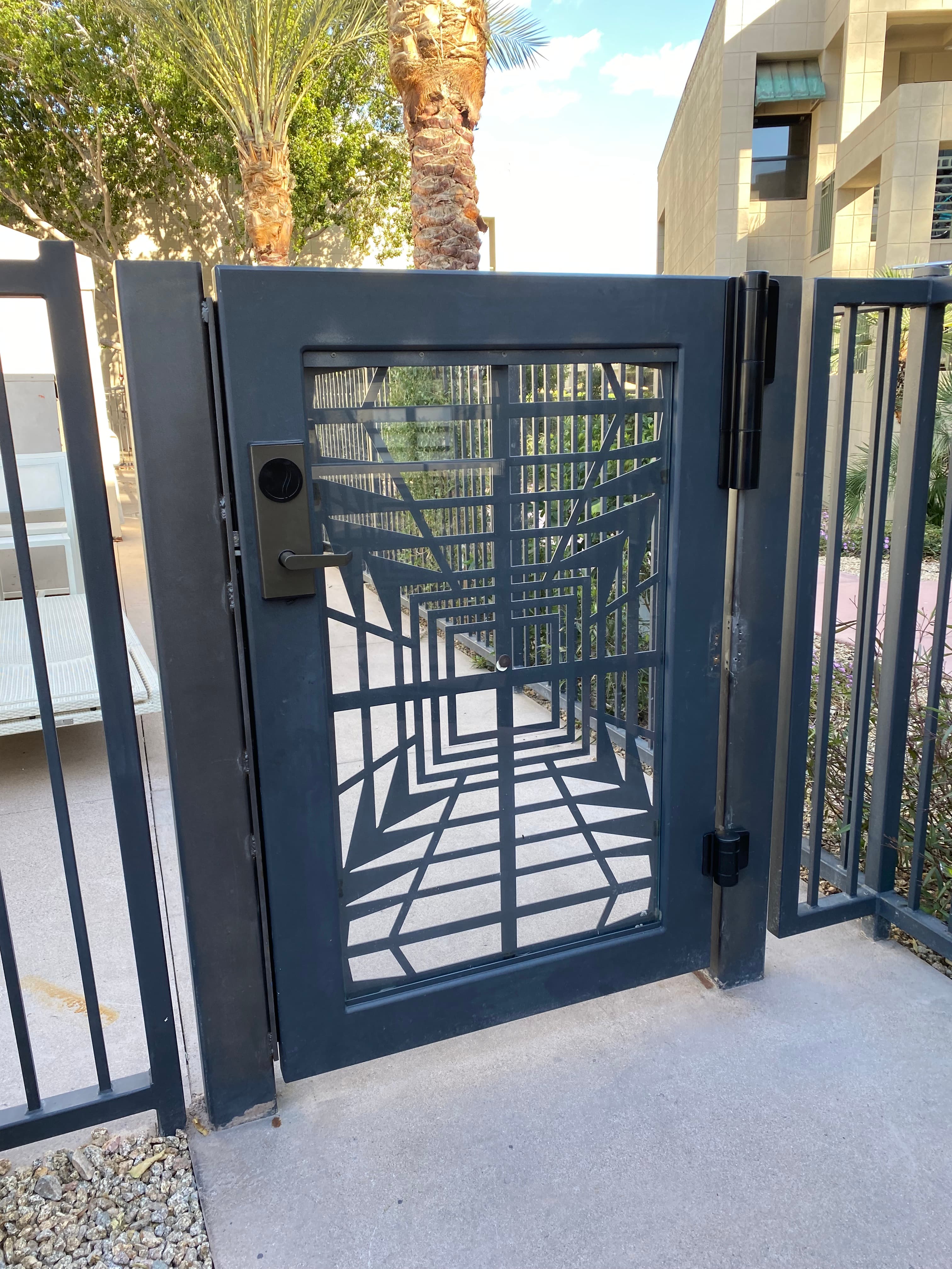Custom metal gate for resort exterior access