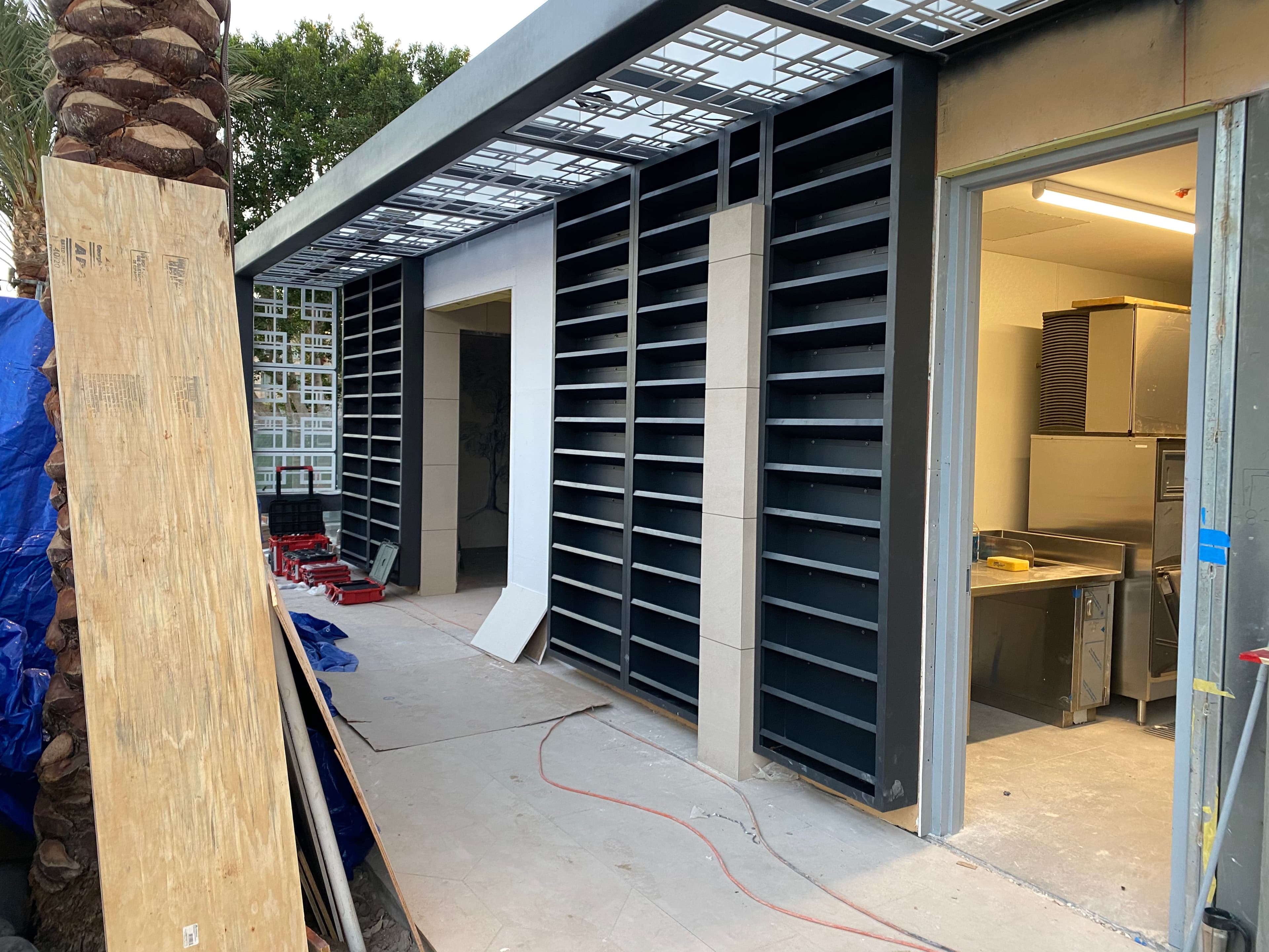 Perforated metal sunshade with custom pattern